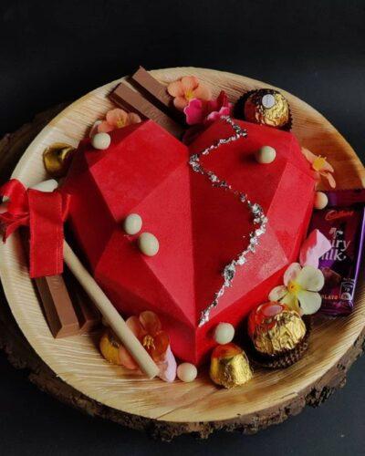 Red heart pinata Cake