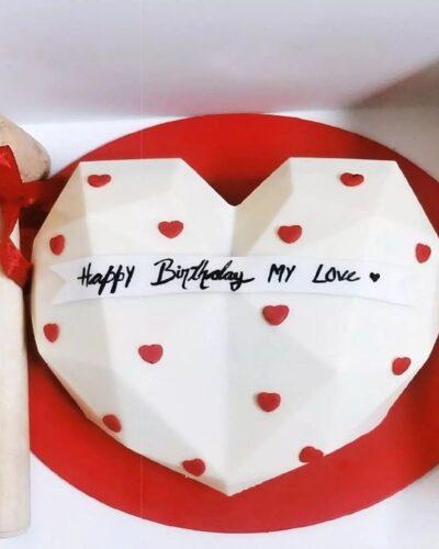 White heart pinata Cake